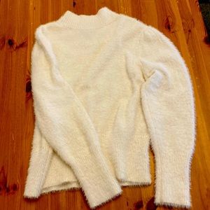 Ultra soft, über fluffy cream sweater with puff-sleeves and high neck
